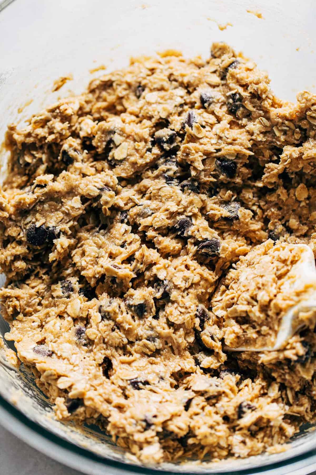 a bowl of gluten free oatmeal chocolate chip cookie doughj