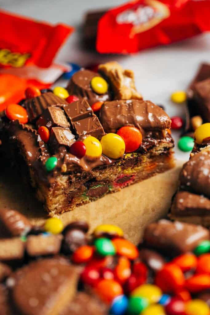 inside a slice of a halloween candy cookie bar