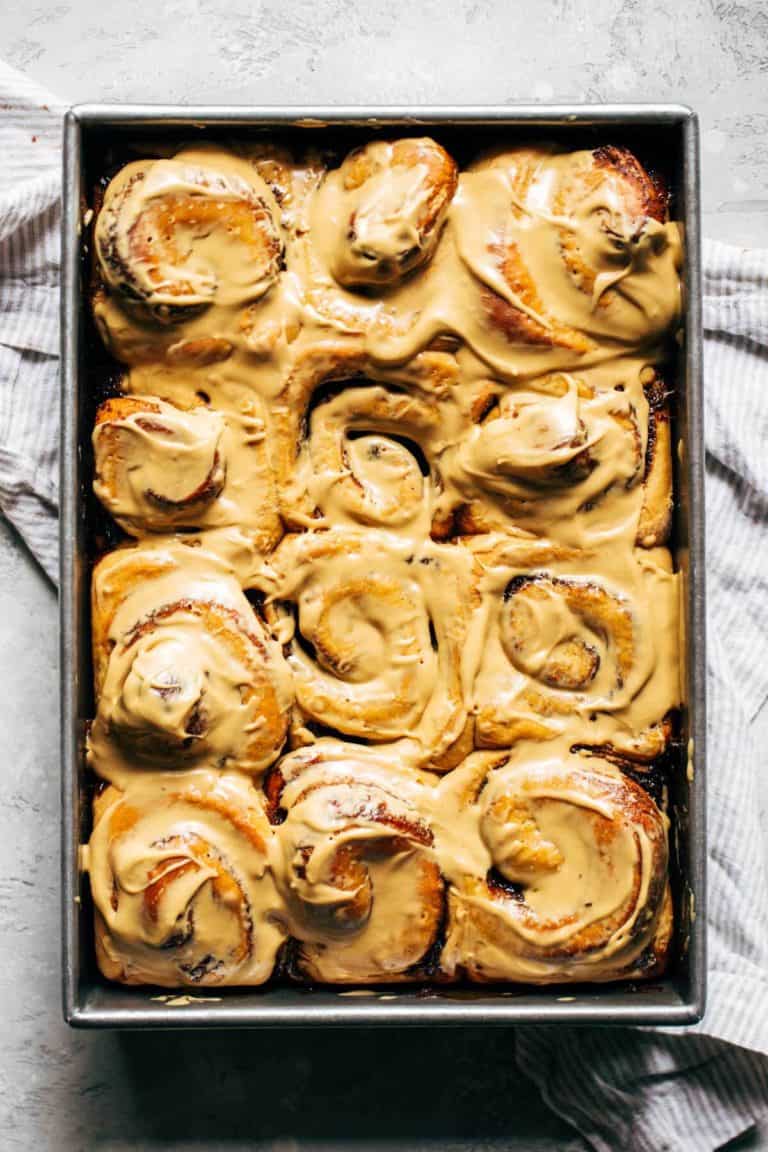 a baking tray full of gingerbread cinnamon rolls