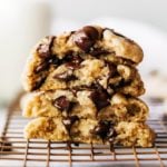 a stack of gooey chocolate chip cookies