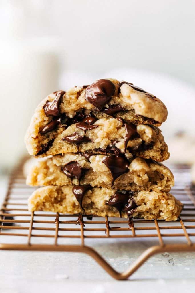 a stack of gooey chocolate chip cookies