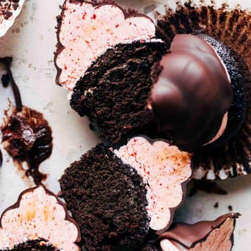 sliced chocolate strawberry hi hat cupcakes laying in their sides