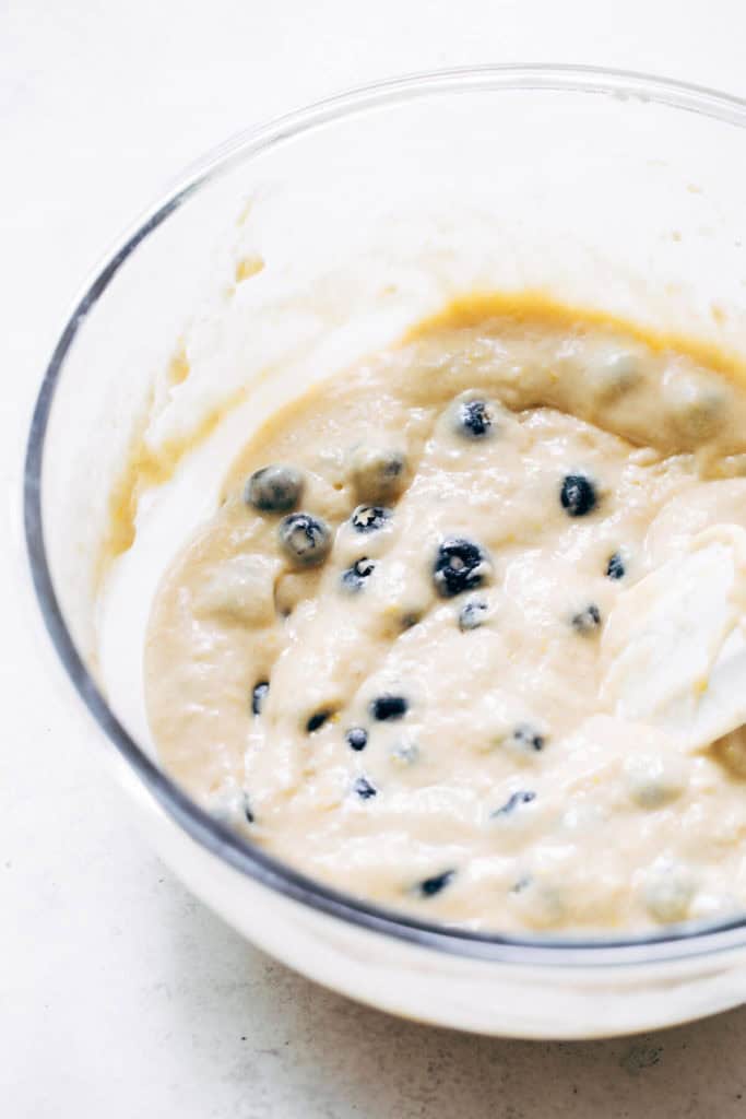 a bowl of lemon blueberry muffin batter