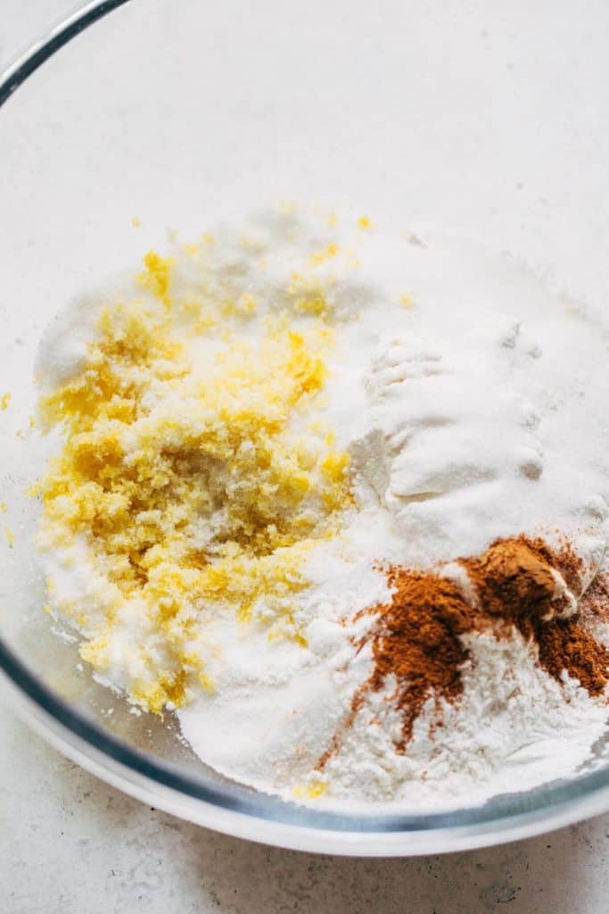 a bowl of lemon zest, flour, sugar, and cinnamon