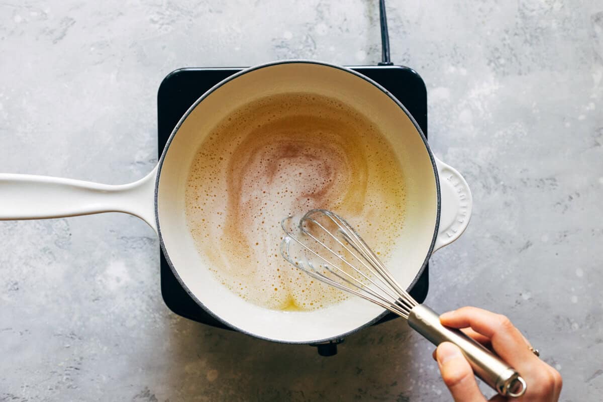 whisking brown butter in a sauce pan