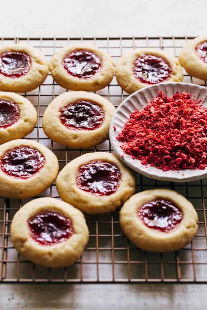 strawberry cookies on a cooling rack