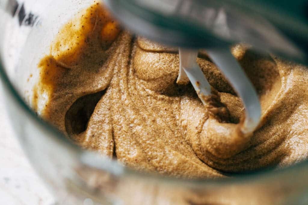 a bowl of cookie dough wet ingredients mixed together