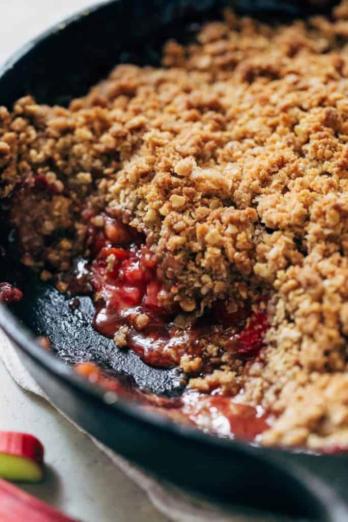 close up on the inside of strawberry rhubarb crisp