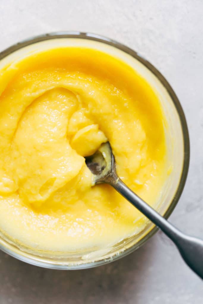 a bowl of homemade mango curd