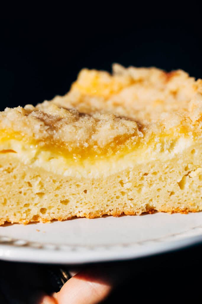 close up on slice of lemon cream cheese coffee cake