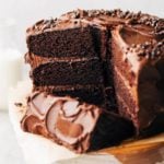 sliced chocolate cake on a cake stand