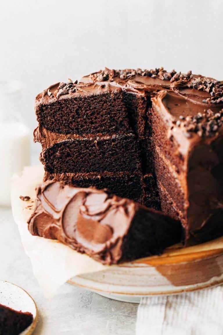 sliced chocolate cake on a cake stand