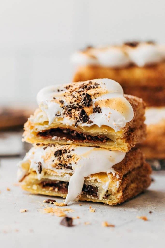 a snickerdoodle smore split in half and stacked on top of each other