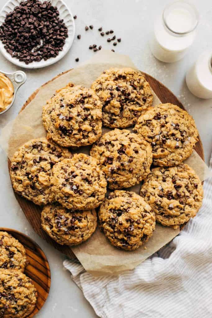 a round serving platter full of oatmeal chocolate chip cookies