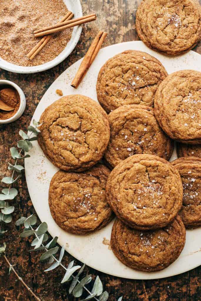 pumpkin cookies arranged on a white serving tray