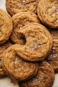 close up on a pumpkin cookie with a bite taken out