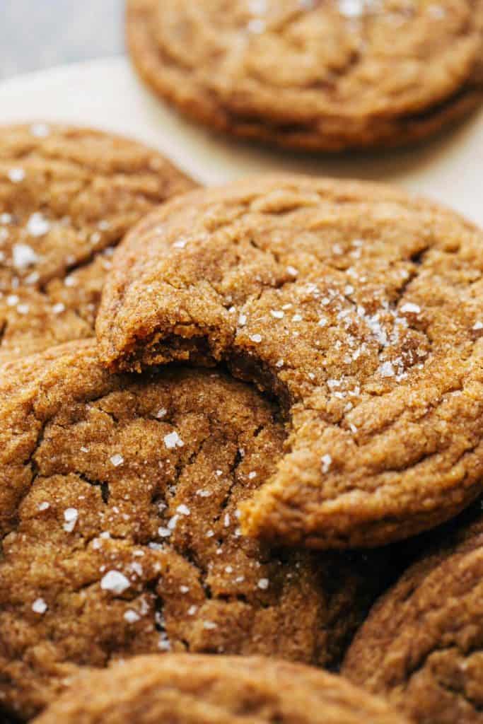 close up on a pumpkin cookie with a bite taken out