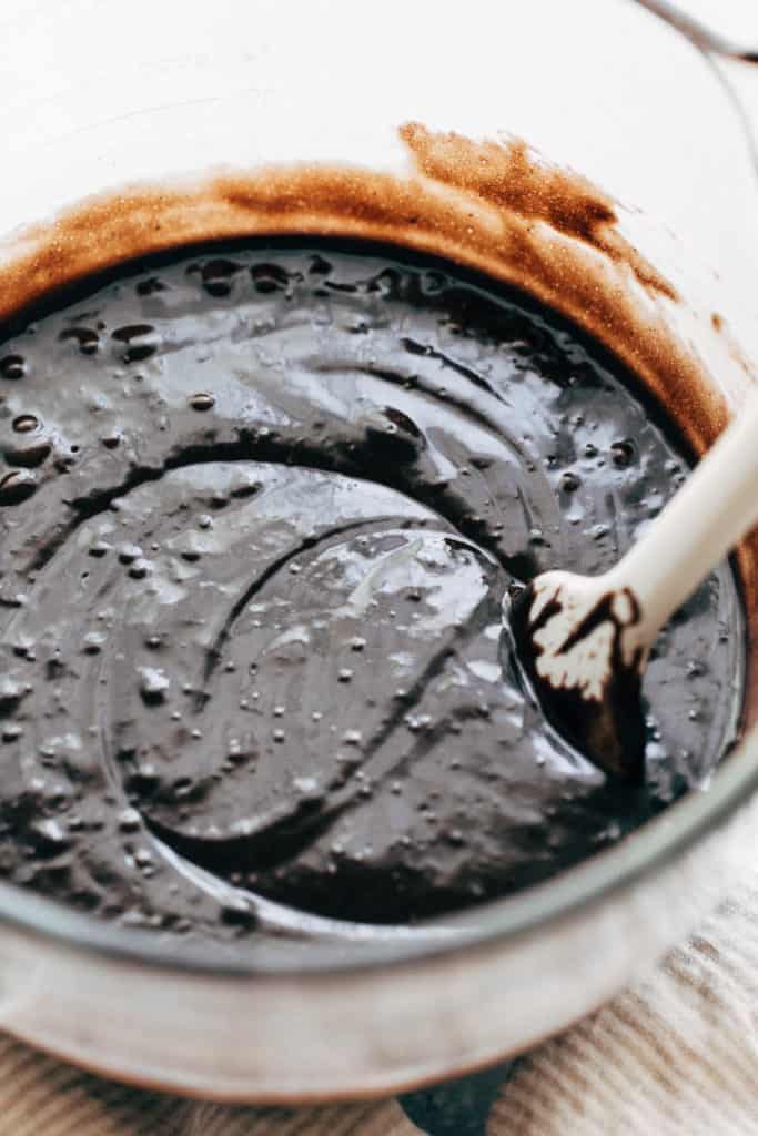 a bowl of black velvet cake batter