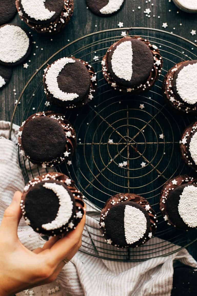 lifting a cupcake from a tray