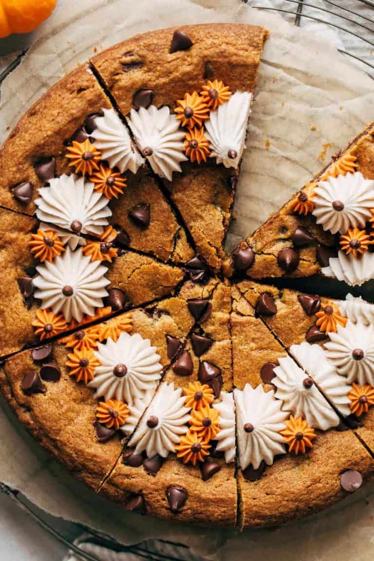 close up on the top of a sliced pumpkin cookie cake