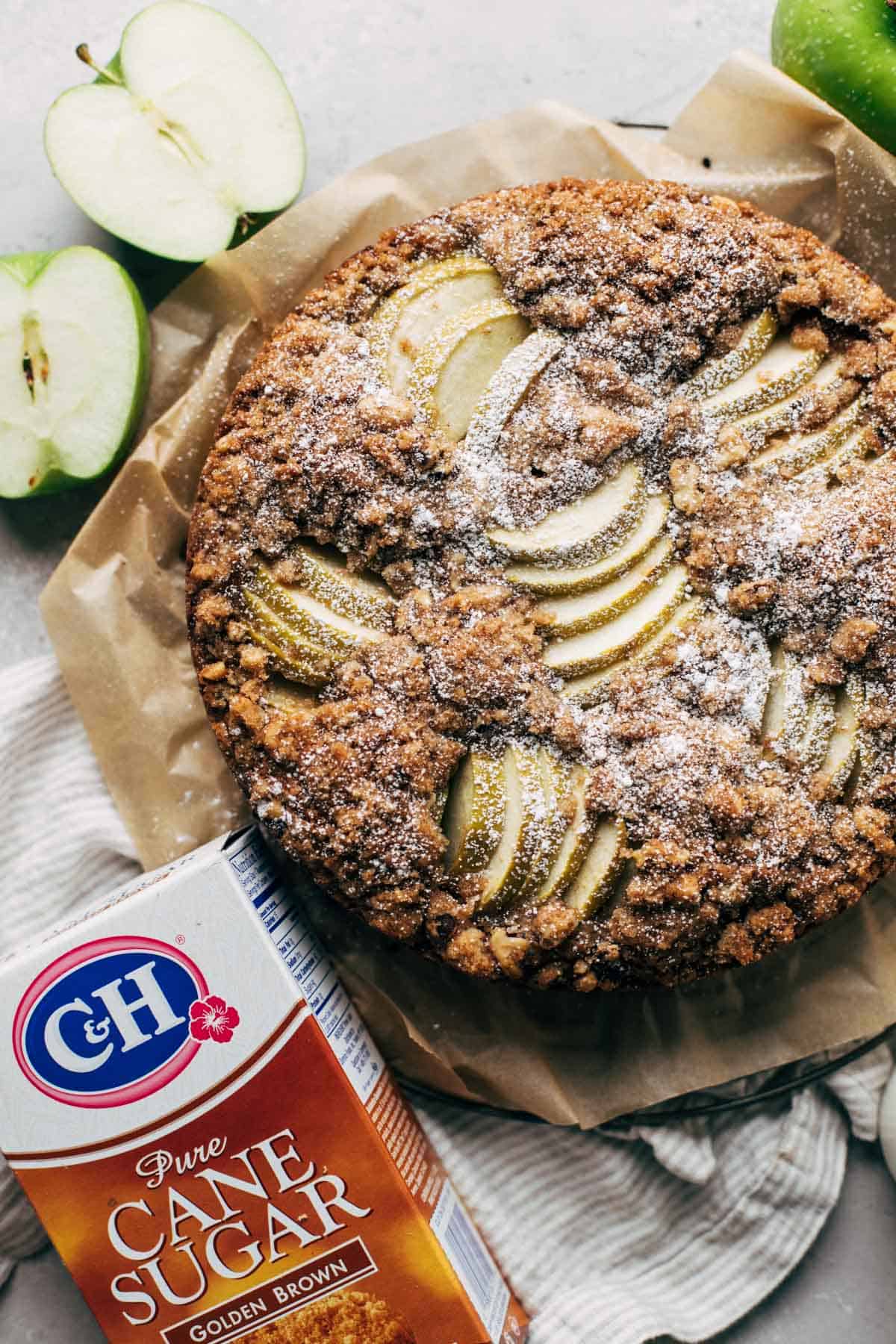 the top of an apple cake baked with slices of apples on top