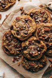 the top view of butter pecan cookies on a wood tray