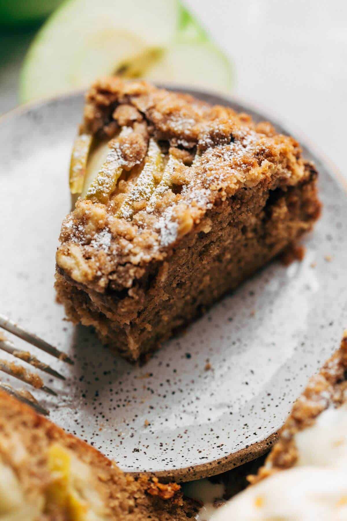 an apple cake slice on a plate