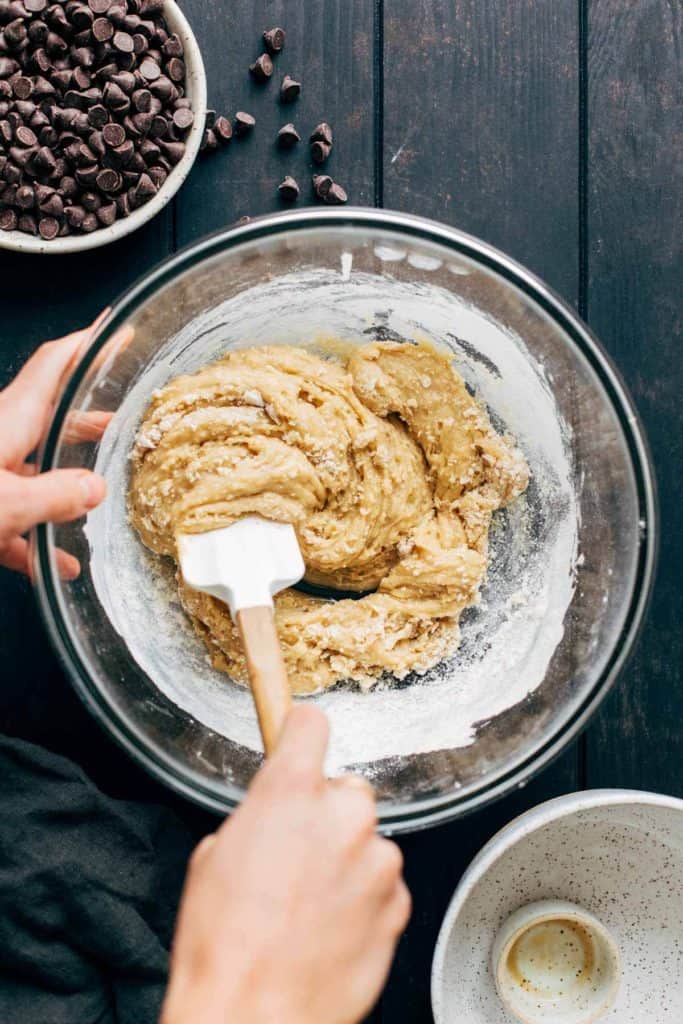 folding dry ingredients into cookie dough