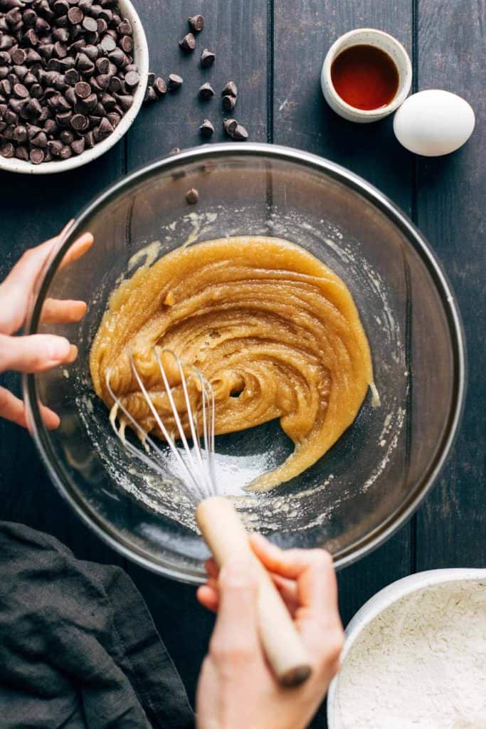 whisking together butter and sugar into a paste consistency