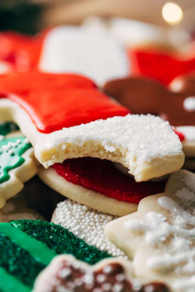 close up on a bite taken from a sugar cookie