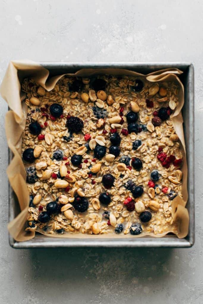 peanut butter and jelly baked oatmeal batter in baking pan