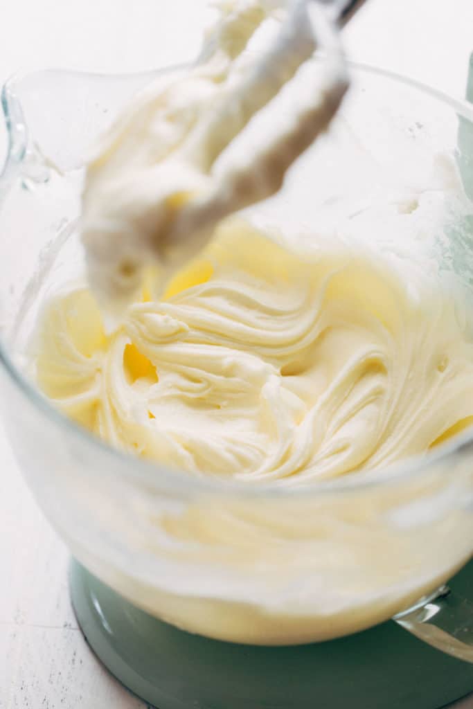 a stand mixing bowl of cream cheese frosting