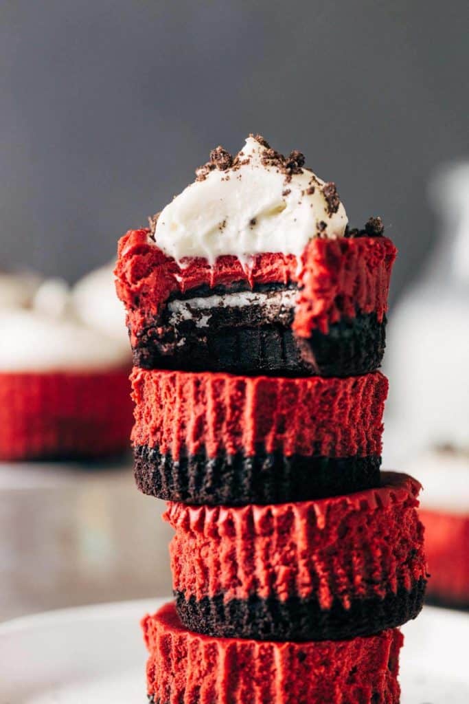 close up on a stack of mini red velvet cheesecakes