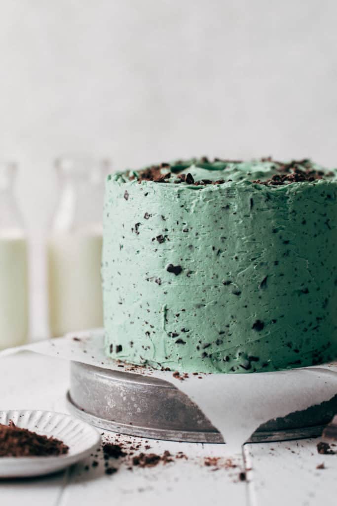 close up on the side of a mint chip layer cake