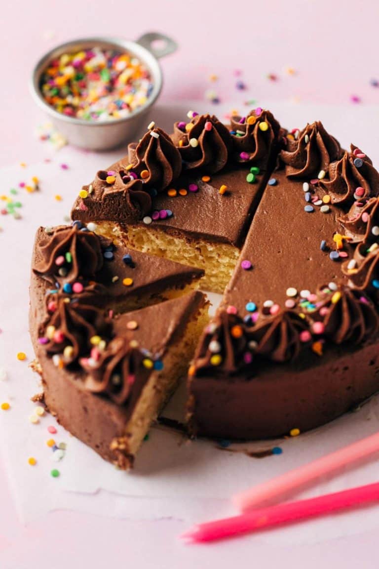 slices of cake with a small birthday cake