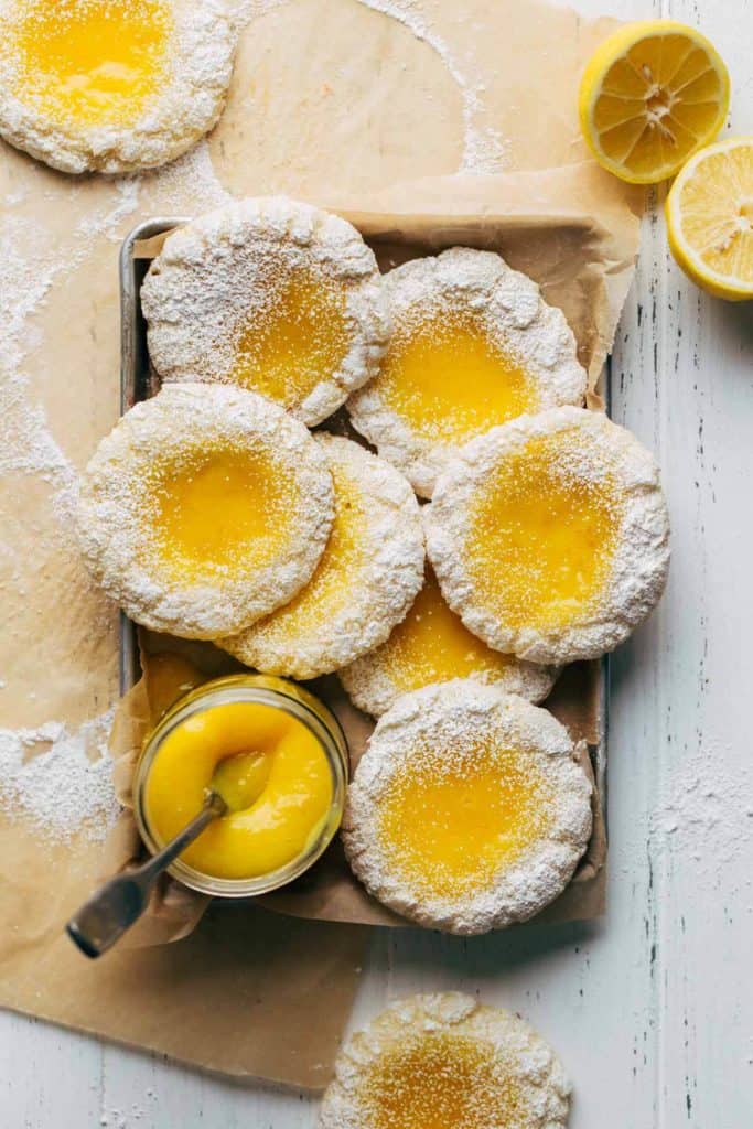 lemon bar cookies arranged on a small metal tray