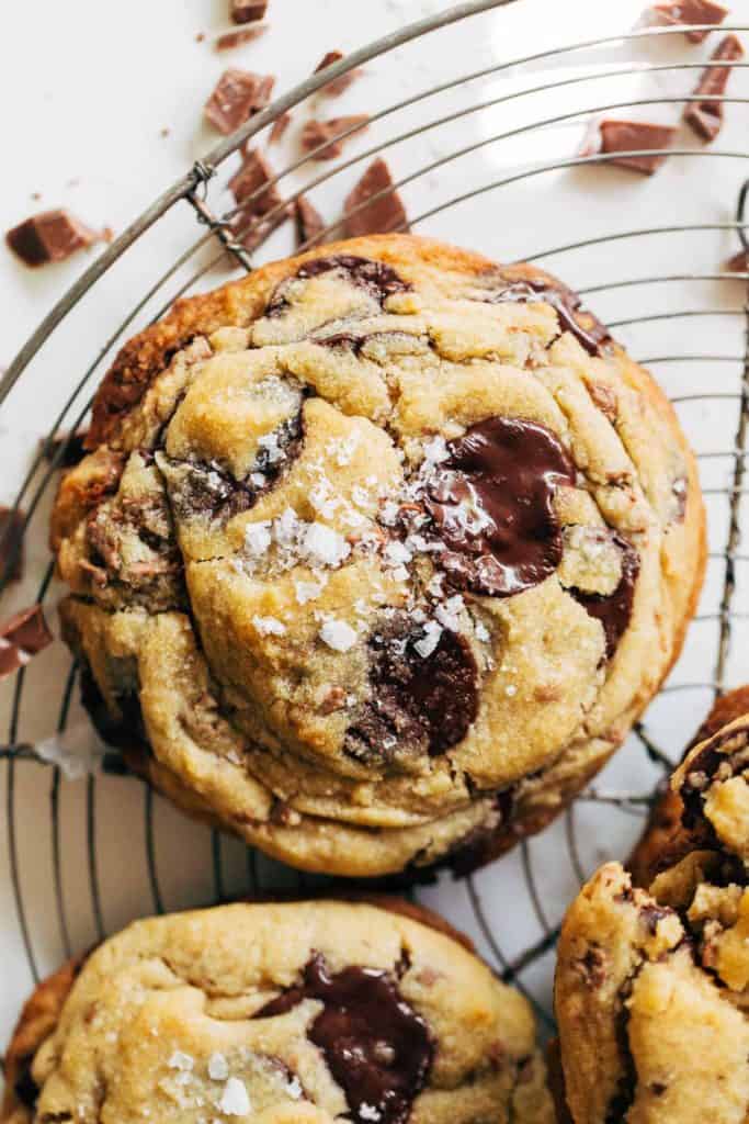 close up on the top of a large bakery style chocolate chip cookie