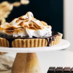 no bake smores cheesecake topped with toasted marshmallow meringue