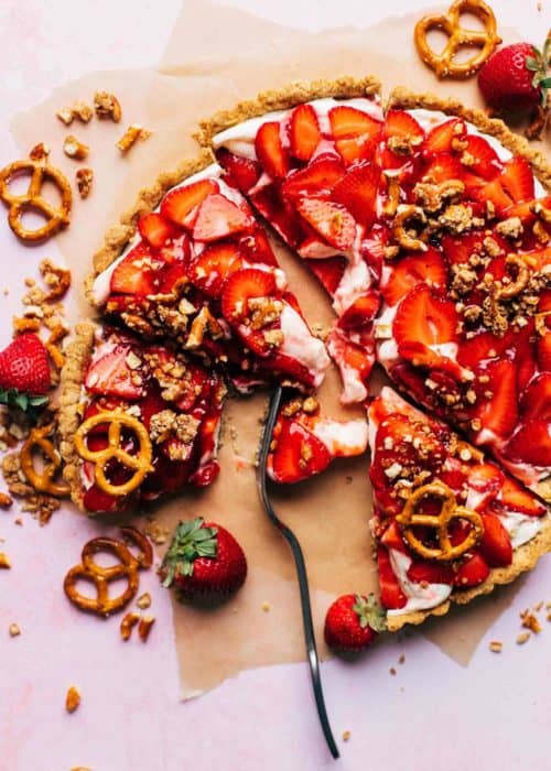 the top of a sliced strawberry tart