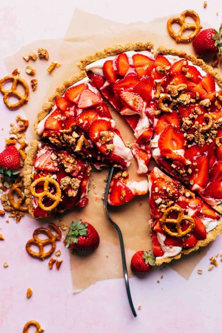 the top of a sliced strawberry tart