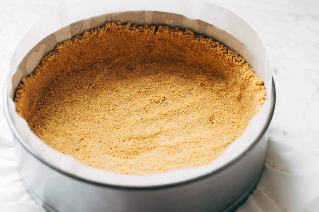 a graham cracker crust pressed into a pan