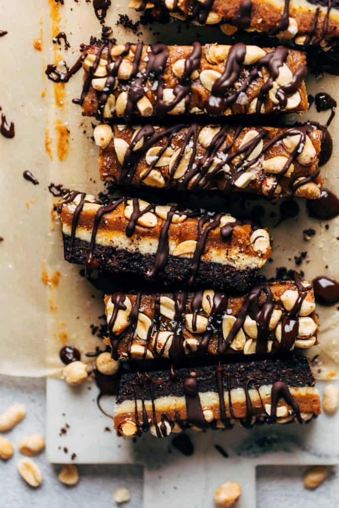 vegan snickers bars sliced and layer on their side