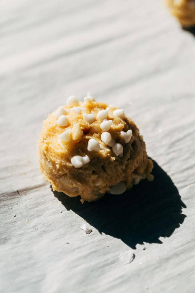 a white chocolate macadamia nut cookie dough ball