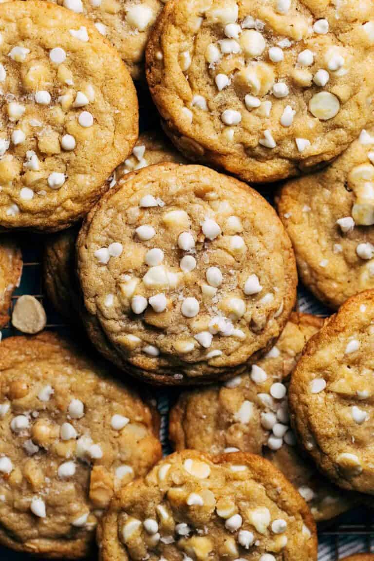 close up on the top of a white chocolate macadamia nut cookie