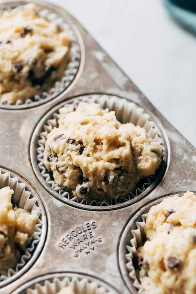 muffin batter scooped into cupcake liners