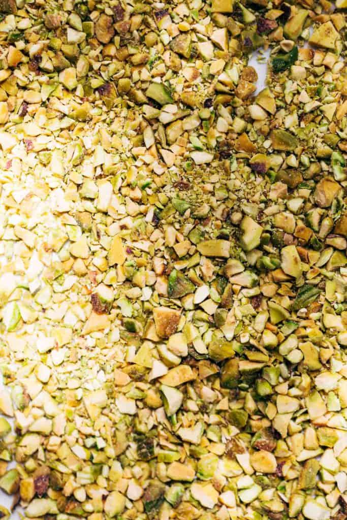 finely chopped pistachios spread even on a plate