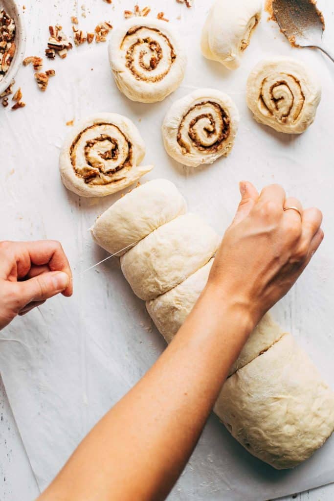 cutting cinnamon rolls with floss