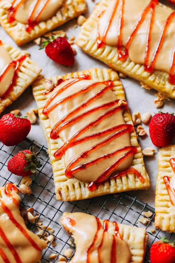 close up on a peanut butter and jelly pop tart drizzled with jelly