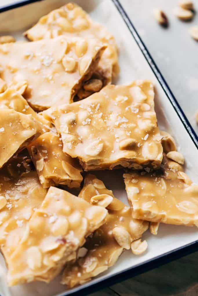 close up on the tops of peanut brittle pieces