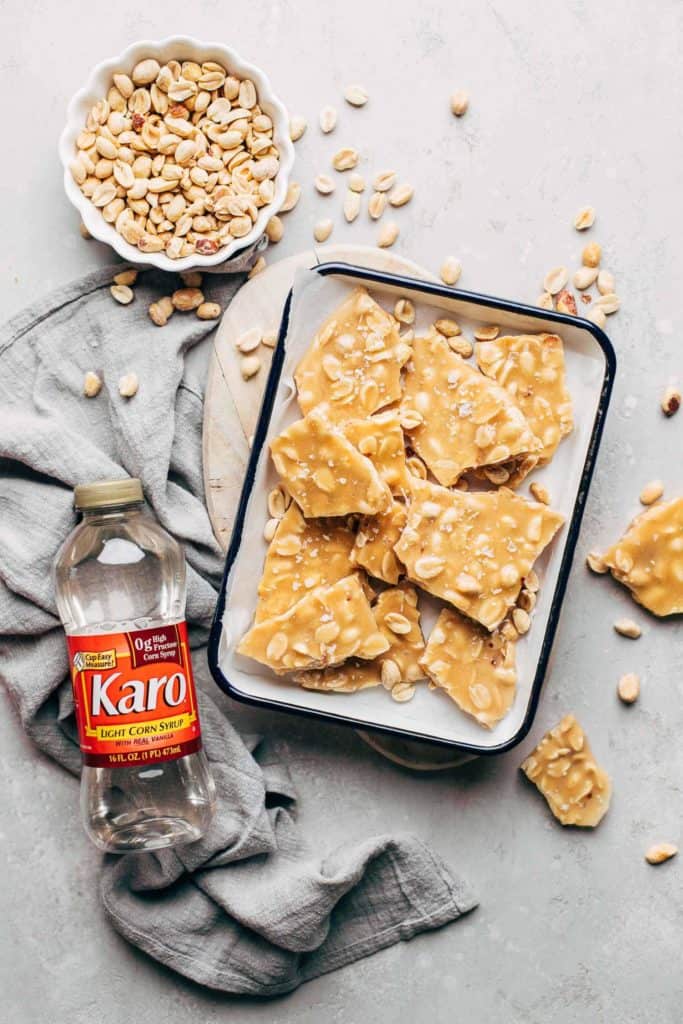 peanut brittle pieces in a small tray